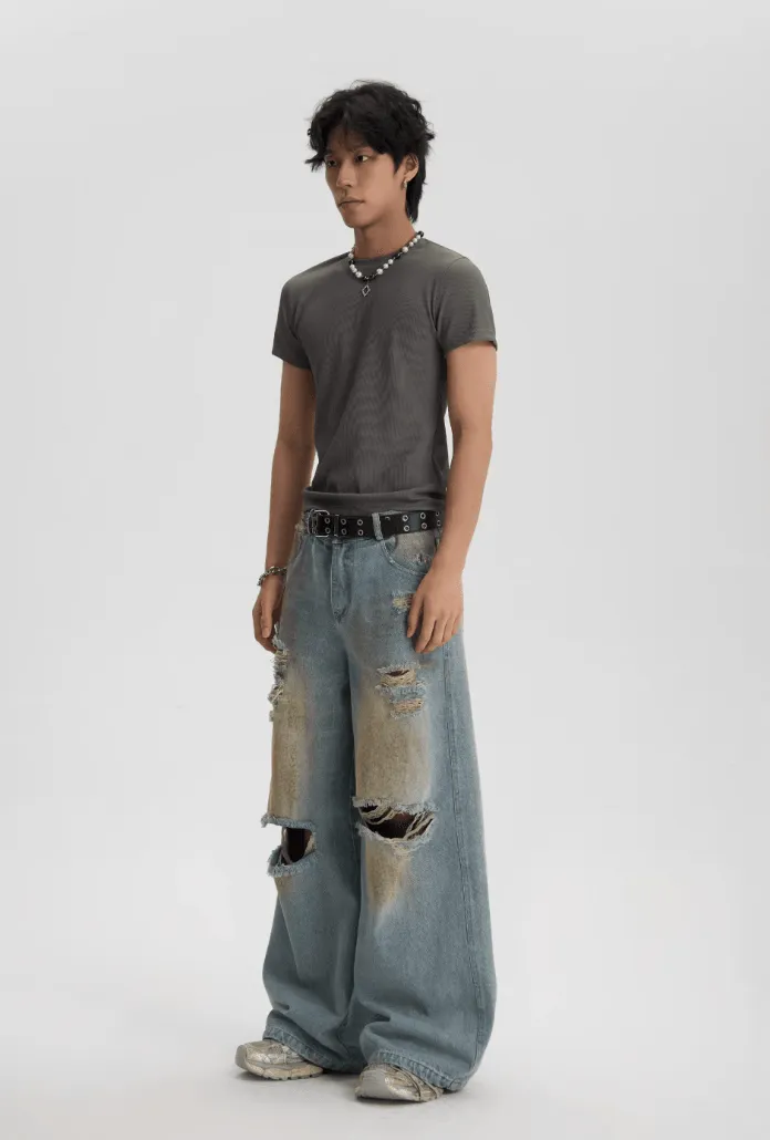 Distressed And Ripped Baggy Jeans With Washed Effect